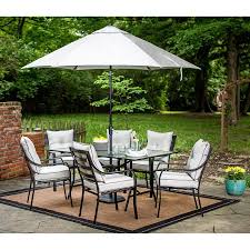 Hanover Lavallette 7 Piece Black Frame Patio Set With Silver Linings Cushions Lowes Com Outdoor Dining Set Patio Patio Set