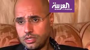 معمر القذافي ، رئيس الدولة الليبي ، يلقي خطابه الأول كرئيس للاتحاد الأفريقي في القاعة العامة لمبنى الأمم المتحدة في أديس أبابا، إثيوبيا، خلال قمة الاتحاد الأفريقي الثانية عشرة في 2 فبراير 2009. Ø­ÙØªØ± ÙŠØµÙ Ø³ÙŠÙ Ø§Ù„Ø¥Ø³Ù„Ø§Ù… Ø§Ù„Ù‚Ø°Ø§ÙÙŠ Ø¨Ø§Ù„Ù…Ø³ÙƒÙŠÙ† Ø§Ù„Ø°ÙŠ ÙŠØ±Ø§Ù‡Ù† Ø¹Ù„ÙŠÙ‡ Ø¹Ø¯Ø¯ Ù…Ù† Ø§Ù„Ø³Ø°Ø¬ Youtube