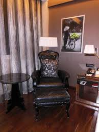 Roundhill furniture blended leather tufted accent chair with oversized seating, red. This Oversized Black Leather Chair Made Me Feel Like I Was On A Tim Burton Set Picture Of Movenpick Hotel Hanoi Tripadvisor