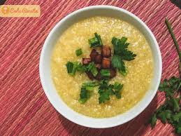 3 colheres (sopa) de óleo 2 cebolas picadas 1 folha de louro ½ quilo de quirera 1 ½ litro de água 2 quilos de costelinha suína em pedaços pequenos suco de 2 limões cravos ou rosa 1 colher (sopa) de sal 1 pimenta dedo de moça picadinha Canjiquinha Com Costelinha Simplesmente Deliciosa Cada Receita