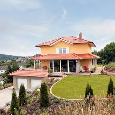 Runder Garten Zu Mediterranem Fertighaus Haus Bauen Lassen Haus Bauen Haus Mit Einliegerwohnung