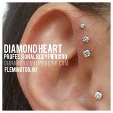 Triple Forward Helix And Tragus Earings Piercings Piercing Cute Ear Piercings