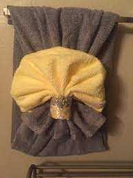 And of course, the bar below will hold the towel. Towel Deco Bathroom Towel Decor Fancy Towels Bathroom Towels