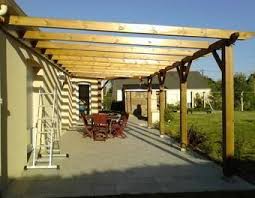 Construction D Une Pergola En Bois Bois Brande De Bruyere Pergoladeck Construire Pergola Bois Pergola Bois Pergola Adossee Bois
