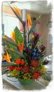 Bird Of Paradise Arrangement Tropical Arrangement Of Blue Dendrobium Orchids Birds Of Paradise Protea Green Cymbi Tropical Floral Arrangements Blue Dendrobium Orchids Dendrobium Orchids