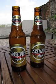 Medalla Puerto Rican Beer They Used To Sell This Beer In The States And Now I Can T Find It Anywhere Puerto Ricans Puerto Rican Culture Puerto Rican Recipes