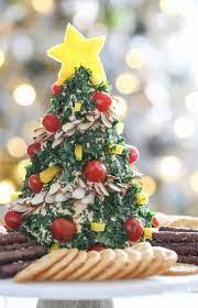 Whether it's classic deviled eggs or shrimp cocktail, find some great ideas that range from appetizing plates to elegant hors d'oeuvres. Festive Christmas Tree Cheese Ball Appetizer Recipe Best Holiday Appetizers Christmas Appetizers Holiday Appetizers