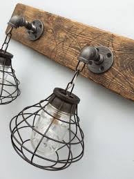 Our artists and metal smiths have crafted from steel, the most extensive. Vanity Light Fixture 2 Mason Jar Light Fixture With Shade Bathroom Light Rusti Rustic Light Fixtures Rustic Bathroom Light Fixtures Rustic Bathroom Lighting
