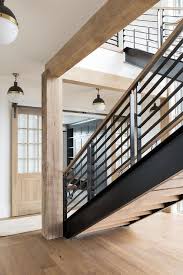 Buy great products from our spindles category online at wickes.co.uk. Rustic Wooden Beams Around Black And Tan Staircase Cottage Entrance Foyer