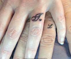 Pin By Stacey Mcglew On Tattoo Inspiration Wedding Band Tattoo Wedding Ring Tattoo Band Tattoo
