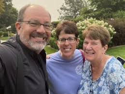 Fr. Dan Belanger Graduating with his Confirmation Students