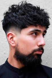 A faded haircut with short sides and back while your wavy locks are left a bit longer on top is one sleek way to wear a haircut for men with wavy hair. How To Get And Manage Wavy Hair Men Menshaircuts Com