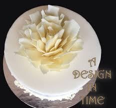 White Ganache Cake With White Chocolate Shaving Flower White Chocolate Shavings Ganache Cake Specialty Cakes