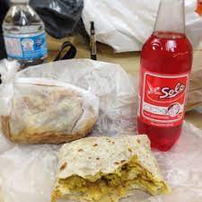 Chicken Roti Doubles And A Red Solo Trini Food Food Chicken Roti