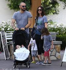 Brian austin green and megan fox seem to be stronger than ever as they hold hands leaving the commons in calabasas.the rarely shot couple megan fox and brian austin green took turns carrying their youngest child, journey, while shopping for groceries at bristol farms in los angeles. Megan Fox And Brian Austin Green Take Baby Journey And His Older Brothers On Family Outing Daily Mail Online