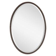 In compact bathrooms, a lighted vanity mirror allows you to accomplish two tasks at once by providing reflection for description: Sherise Bronze Oval Mirror Uttermost