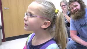 Former professional wrestler's biggest challenge was out of the ring,  helping his daughter with hearing loss