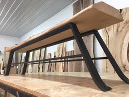 It is much easier to maneuver dining chairs if there is at least 24 inches of rug extending from the edge of the table on all sides, as shown in this design by d2 interiors. Hand Forged Steel Bench Table Legs Bench Table Base