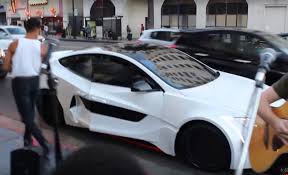 Add style and performance to your car with this superior body kit. Forget Falcon Wing Doors How About Tesla Suicide Doors