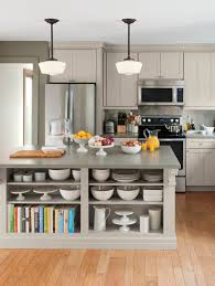 People gather to snack, chat go with an island that has some built in shelving. Open Shelving In A Kitchen Island Creates Storage Without Giving Up Style Display Heirloom China And Store Kitchen Layout Kitchen Style Kitchen Cabinet Colors