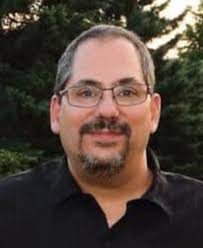 John T. Behrens Obituary