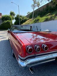 Image result for Regal Red 1965 Chevrolet