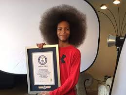At the time, she was 16 years old, and her hair measured 170.5 cm (5 ft 7 in). Guinness World Record 13 Year Old Boy With World S Largest Afro Measuring 25 4 Cms The Economic Times