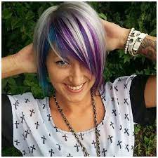 Coloring your hair has developed through time and women of all ages and especially young girls love it. Fun Short Hair Color Funshorthaircolor Cute Short Hair With Blue And Purple Under Blonde In 2021 Crop Hair Hair Styles Short Cropped Hair