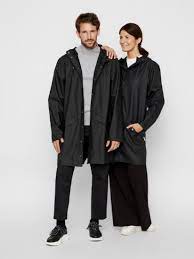 Based on an early initiative to interpret the traditional rubber raincoat in a novel way, the company has, since… Rains Long Rain Jacket Black