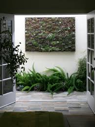 An undulating stone wall creates a barrier while looking stylish at the same time. Outdoor Natural Stone Wall Cladding Novocom Top