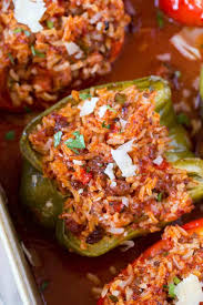 Stuffed bell peppers with rice, ground beef or turkey, tomato sauce and seasonings. Stuffed Peppers Dinner Then Dessert