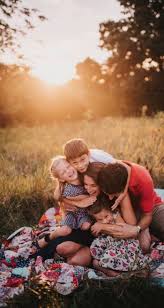 Authentic Natural Lifestyle Family Photos And Non Cheesy Posing Ideas And Activities For Your Next Summer Family Photos Family Picture Poses Family Photo Pose