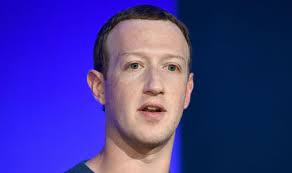 Britain threatens to sue Facebook founder over videos glorifying terror