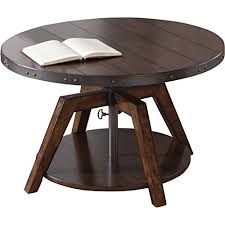 The great thing about these coffee tables is that if you don't see something you like on our showroom floor, you can build your own custom coffee table from a set of custom options. Distressed Amp Industrial Chic Small Round Dining Coffee Table In Dark Brown Pine Buy Online In Antigua And Barbuda At Antigua Desertcart Com Productid 41598677