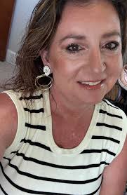 Handmade earrings with peridot and crown flower