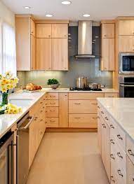 A chic contemporary kitchen arrangement using maple wood: Natural Finish Maple Kitchen Cabinets Tags Natural Maple Kitchen With Maple Kitc Birch Kitchen Cabinets Maple Kitchen Cabinets Kitchen Cabinets And Countertops
