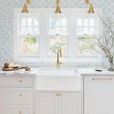 When you need privacy but your kitchen sink window faces a neighbor's home or looks out onto the road, blinds, shutters, and shades are the ideal decision to give the protection you need without compromising natural daylight. Three Windows Over Kitchen Sink Design Ideas