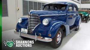 Image result for Mansion Maroon 1938 Oldsmobile