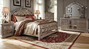 Made with ash swirl and birch veneers and select hardwood solids, finished in a silver toned color with subtle glazing effects to bring out dimension. Birlanny Silver Upholstered Panel Bedroom Set By Ashley