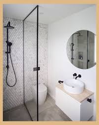 Looking for small bathroom ideas? Penny Tile Feature Wall Ensuite Bathroom Ideas Modern Bathroom Ensuite Bathroom Idea Modern Small Bathrooms Small Bathroom Renovations Small Shower Room