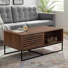 We believe in helping you find the product that is right for you. Walnut Modern Slat Drop Down Door Coffee Table Kirklands