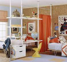 The room is divided by a partial wall that contains desks and study areas for both children. Creative Kids Room Divider Ideas Kinderkamer