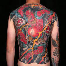 Looking to add a dragon to your japanese tattoo design, consider colors associated with power like bold reds or greens. 50 Raijin Tattoos Meanings Tattoo Designs Ideas