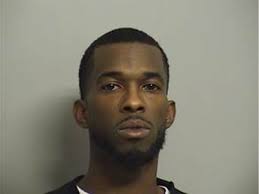 Woman arrested for connection to December death