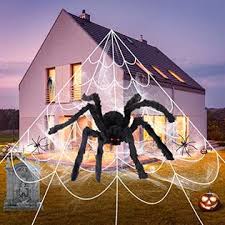 Use fake spiders to decorate a pumpkin with a creatively woven spiderweb design. Cocequc Halloween Spider Decorations 200 Triangular Spider Web 30 Giant Fake Spiders Stretch Cobweb With 2 Small Spiders F