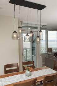 A hanging ceiling lamp is a standard style light that hangs either a metal cord or pole. Begin By Selecting A Chandelier Or Other Low Hanging Lights To Mainly Brighten Your T Dining Room Light Fixtures Dining Light Fixtures Lights Over Dining Table
