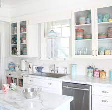 Ok, so maybe you don't need to replace the cabinets, but if you have a laminate countertop with a matching 4 inch backsplash, it is going to be hard to bring your cabinets out of the 90s. Wilsonart Laminate Countertops With A High End Look