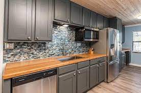 The bespoke kitchen features a huge slab of black granite work surface with a tactile brushed finish. Bamboo Countertops Kitchen Design Guide Bamboo Countertop Countertops Bamboo Countertop Kitchen