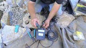 It holds plenty of water, has fountains for aeration, and has lots of most professionals recommend that a pond intended for koi meet a certain set of requirements in. How To Build A Fish Pond Part 19 Wiring Pond Lights Youtube