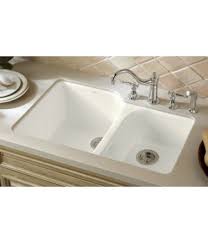 The sink is large, and not having a center divider really creates more space and function without taking up more space in the kitchen. Kohler K 5931 4u 0 Executive Chef Cast Iron Double Bowl Undermount Kitchen Sink White Faucetdepot Com